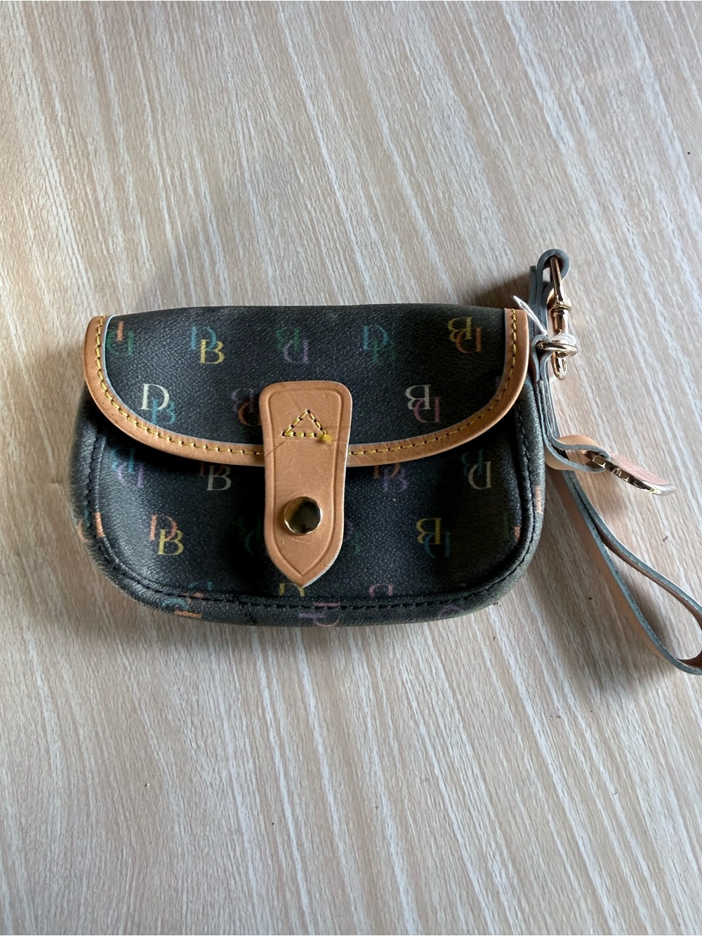 Dooney & Bourke Black Logo Wristlet with Tan Trim
